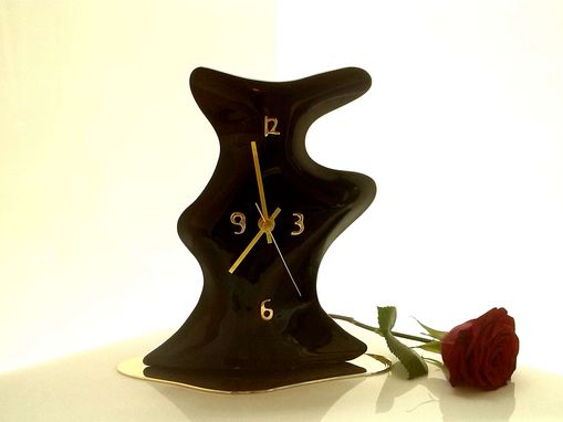 Tisch- oder Kaminuhr Ph�nomen